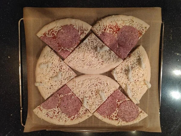 Cut Frozen Pizzas Into Quarters To Fit More In The Oven