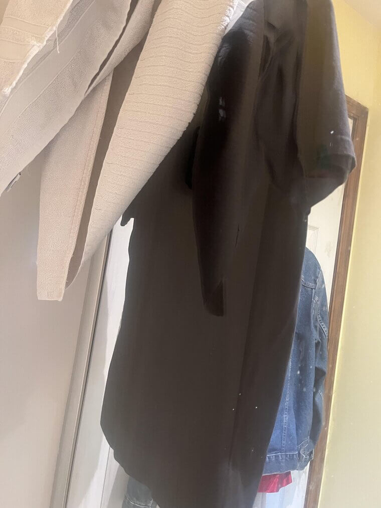 Hang A Dark Shirt Behind Glass To Create A Shower Mirror