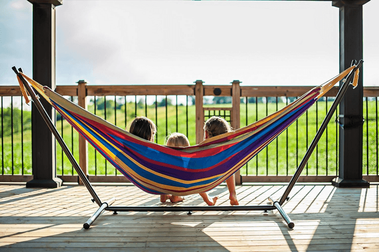 A Spacious Two-Person Cotton Hammock Complete With a Heavy-Duty Metal Frame for Those Who Don't Have the Perfect Trees to Hang a Hammock.