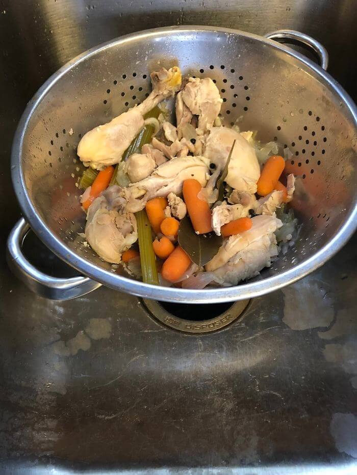 After Hours Of Work For The Chicken Stock, They Poured It Through A Strainer Like The Recipe Said To Do