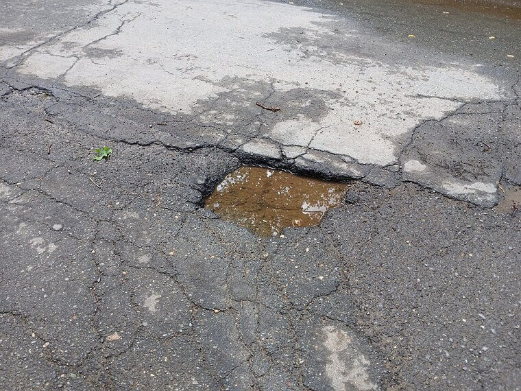 Driving Over Potholes