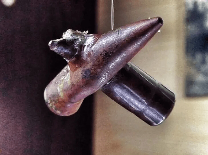 Two Bullets Hitting Each Other