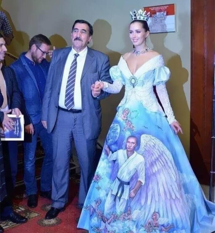 And Who Is That on Her Dress?