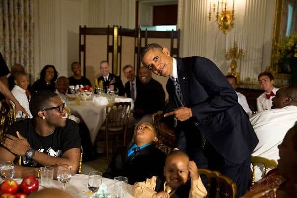 Barak Obama Posed With A Boy Who Fell Asleep At His Father's Day Event