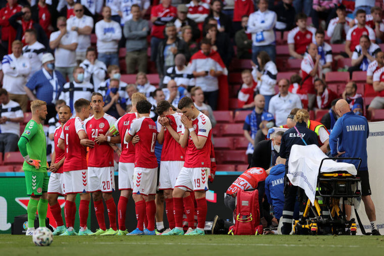 Denmark’s Players Rally Around Christian Eriksen as He Receives Treatment