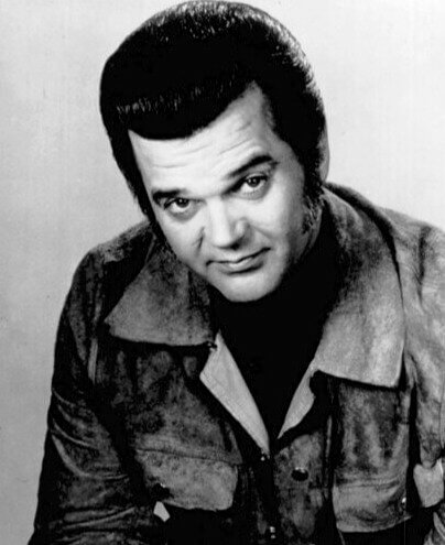 Conway Twitty's 1970s Immobile Helmet Hair Completely Unfazed by Heavy Winds