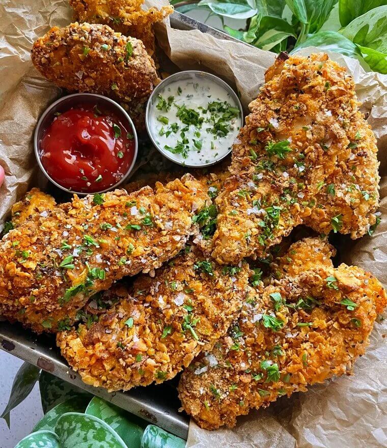 Coating Lean Proteins in Crushed Cornflakes to Achieve a Satisfying Crunch Without Deep Frying