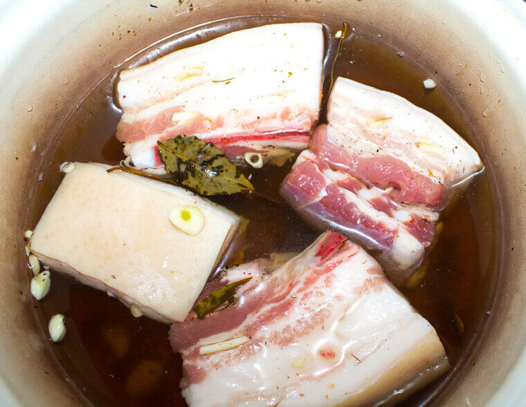 Submerging Whole Poultry in a Savory Brine to Ensure Incredibly Succulent and Juicy Breast Meat