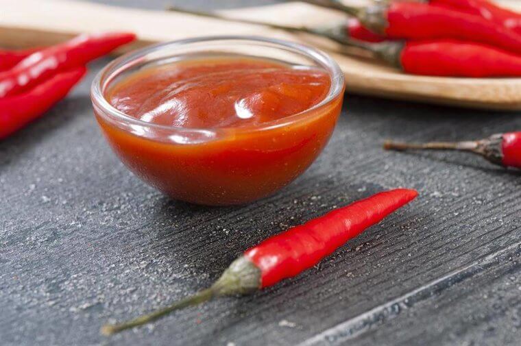Hot Sauce: High Vinegar Content Keeps It Safe in the Pantry While Cold Temps Dull the Spicy Peppers