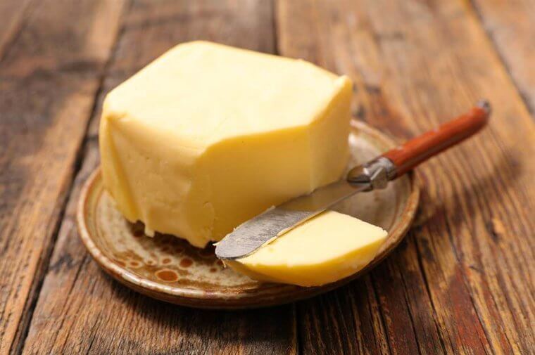 Butter Blocks: Cold Storage Keeps the Fat Rock-Hard and Prevents the Creamy Development of Its Natural Dairy Flavors