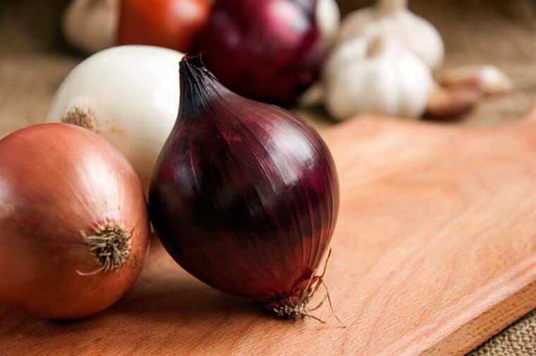 Whole Onions: Lack of Airflow and Excess Moisture Turn Firm Bulbs Soft and Moldy