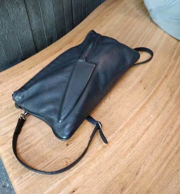 Una Cartera Con Doble Función