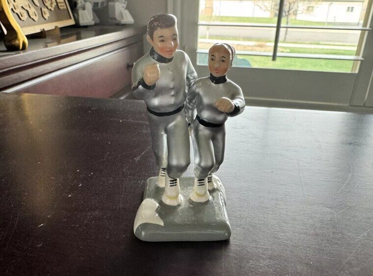 Department 56 Christmas Vacation's Todd and Margo Jogging - $650-$850