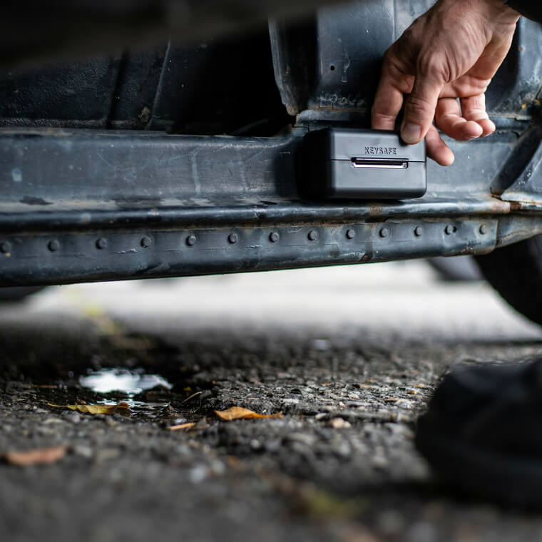 Hiding a Spare Car Key in a Magnetic Box Underneath