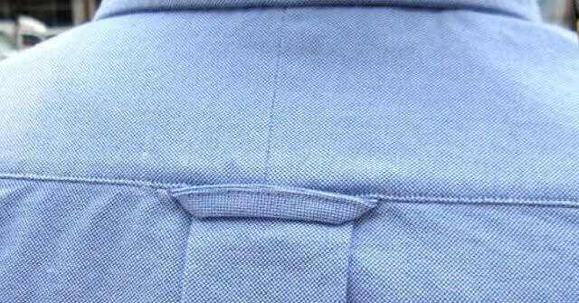 Why Is There A Loop In Back Of Shirt?