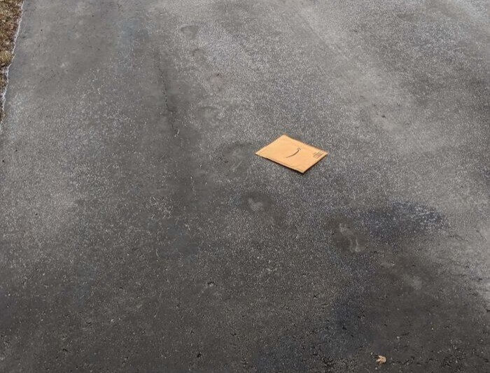 This Person's Package Was Left Right Where It Can Get Run Over
