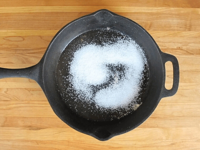 Why You Should Put Some Salt On A Cast Iron Pan