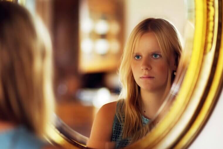 Starting your day with negative self-talk in the mirror