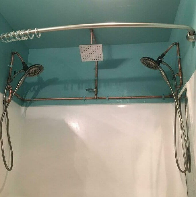 "the House Is Equipped With One Toilet and Three Showers"