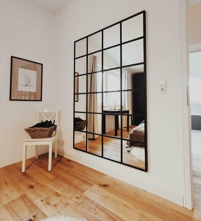 Save Money by Using Smaller Mirror Tiles to Make One Big Mirror