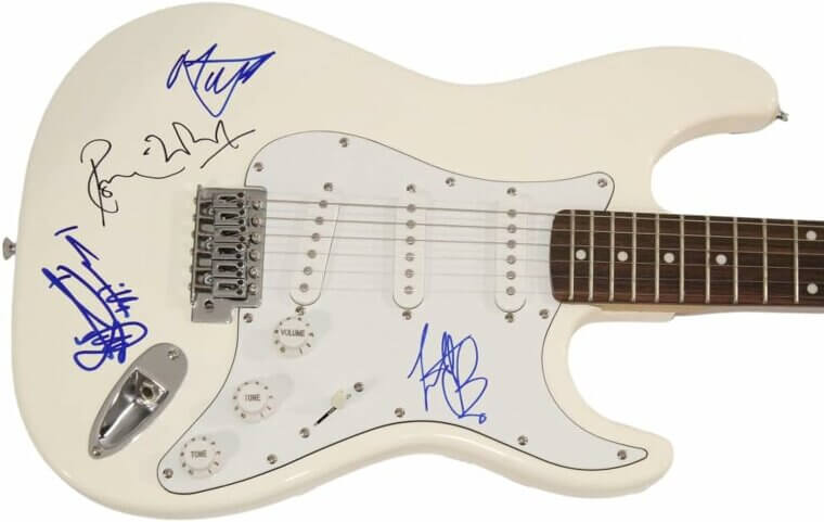 Own a Piece of Rock History With The Stones Guitar - Signed by Legends