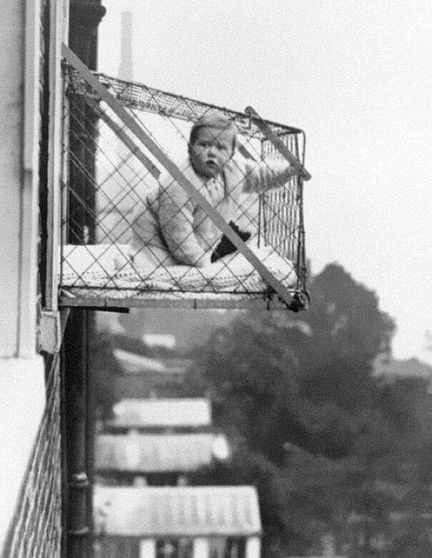 Baby Cages Used To Ensure That Children Get Enough Sunlight And Fresh Air When Living In An Apartment Building, ca. 1937