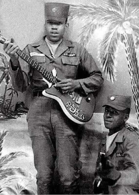 Jimi Hendrix Plays Guitar During Army Service, c. 1961