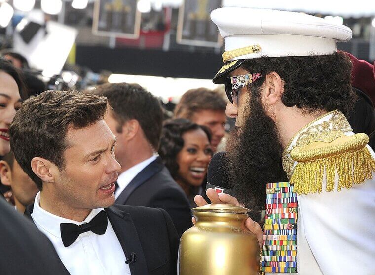 When Sacha Baron Cohen Dumped an Urn Full of Ashes on Ryan Seacrest (2012)