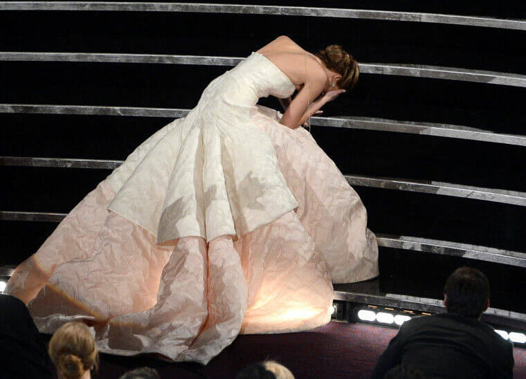 Jennifer Lawrence Tripped on Her Way to Collect Her "Best Actress" Award (2013) and on the Red Carpet (2014)