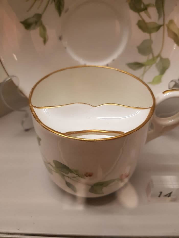 An Old Tea Cup That Keeps Your Mustache Dry