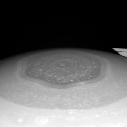 The Hexagon Mystery at the North Pole of Saturn
