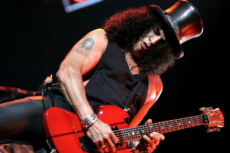 Slash Got Turned Down By Poison For Refusing To Wear Makeup