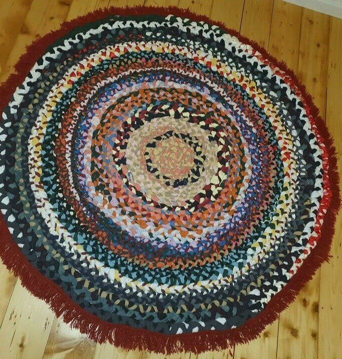 Braiding a Rug Out of Unused Fabric