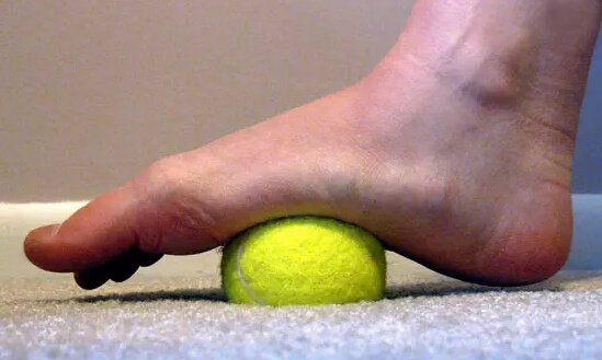 A Tennis Ball for Foot Pain
