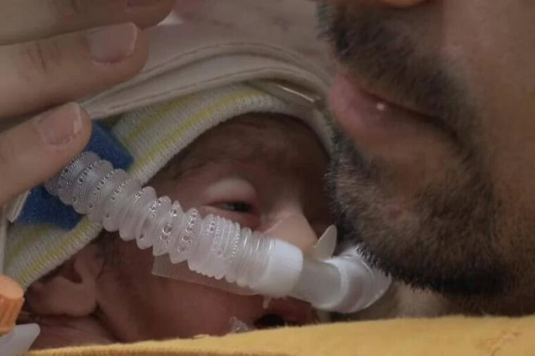 Anabella Looks Up At Dad