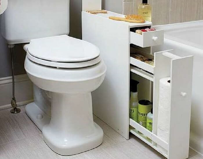 A Thin Rolling Shelve Fits Right Next to the Toilet