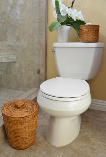 Don't Like Toilet Shelves? Use a Basket