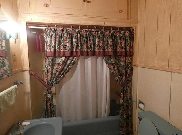 The Plastic Shower Curtain With Big Flowers