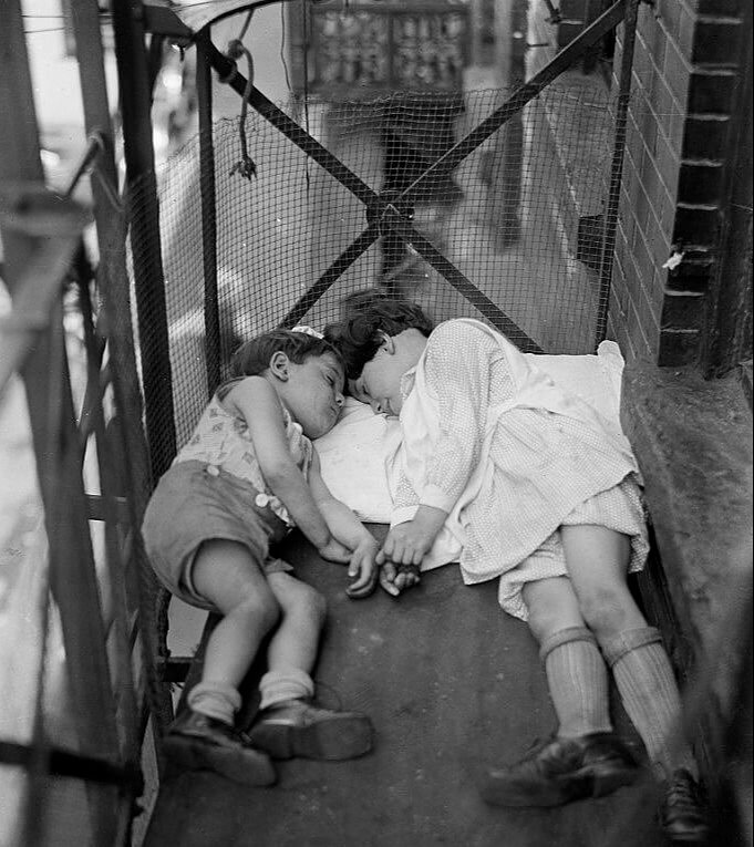 New York Kids Sleeping on the Fire Escape